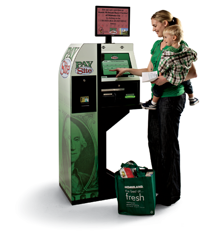 Woman at ATM with baby